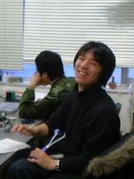 Yuki watches disturbing Mariko and laugh.