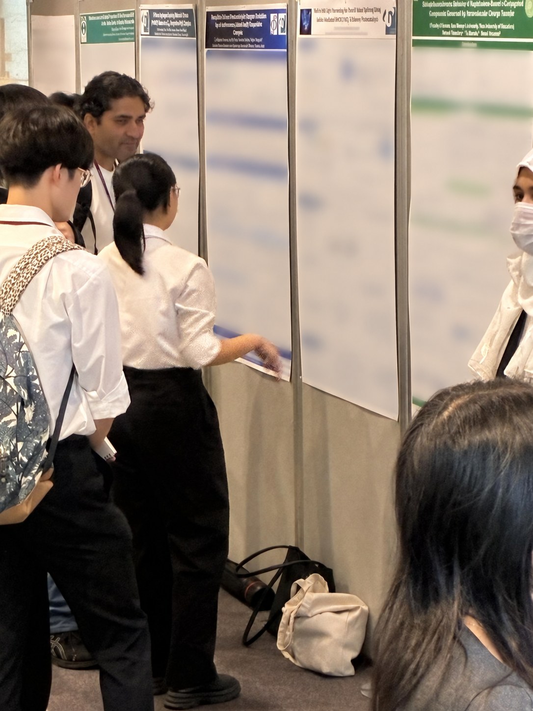 Thi Linh Pham presenting her poster at the anniversary symposium in Kobe.